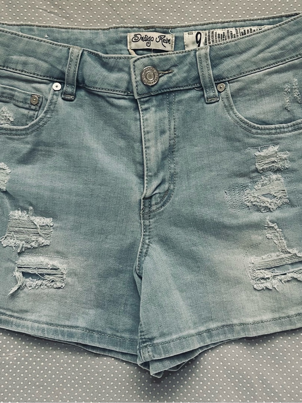 Indigo Rein Women’s Washed Blue Distressed Denim Shorts